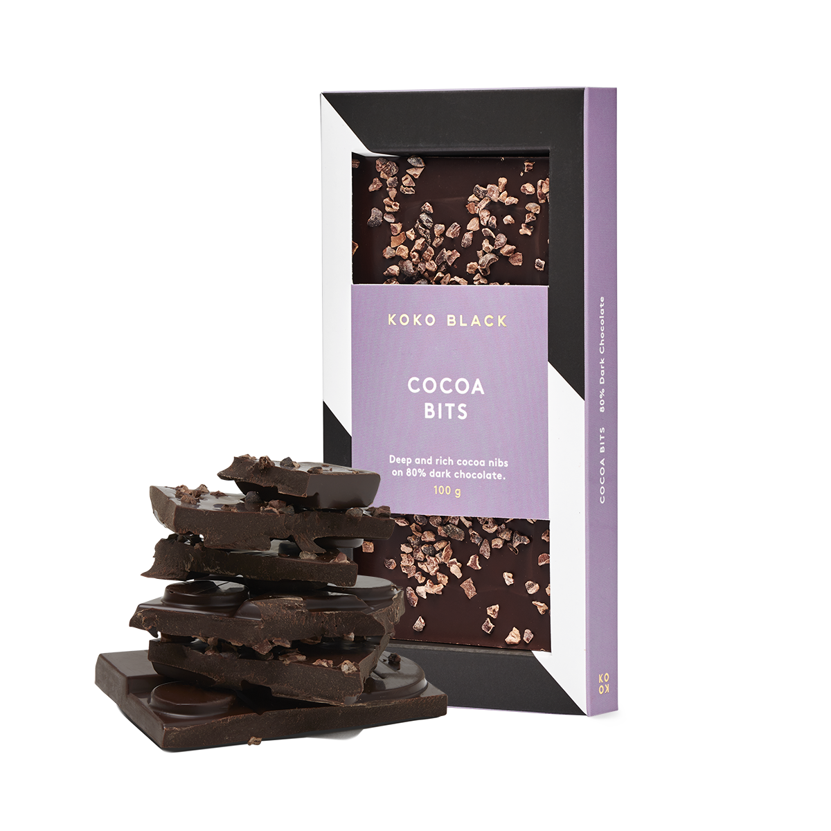 Broken chocolate pieces in front of chocolate block