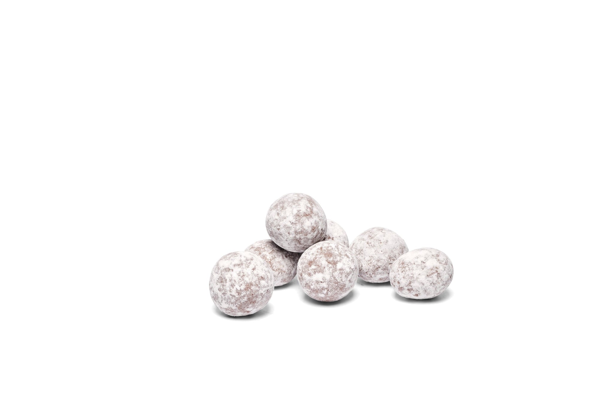 Dusted macadamias placed together